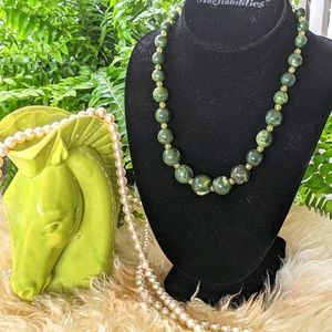 Long pearl necklace and green beaded necklaces